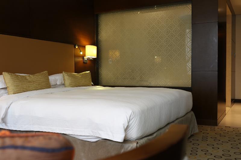 Asiana Hotel Dubai Eksteriør bilde A bedroom at the hotel